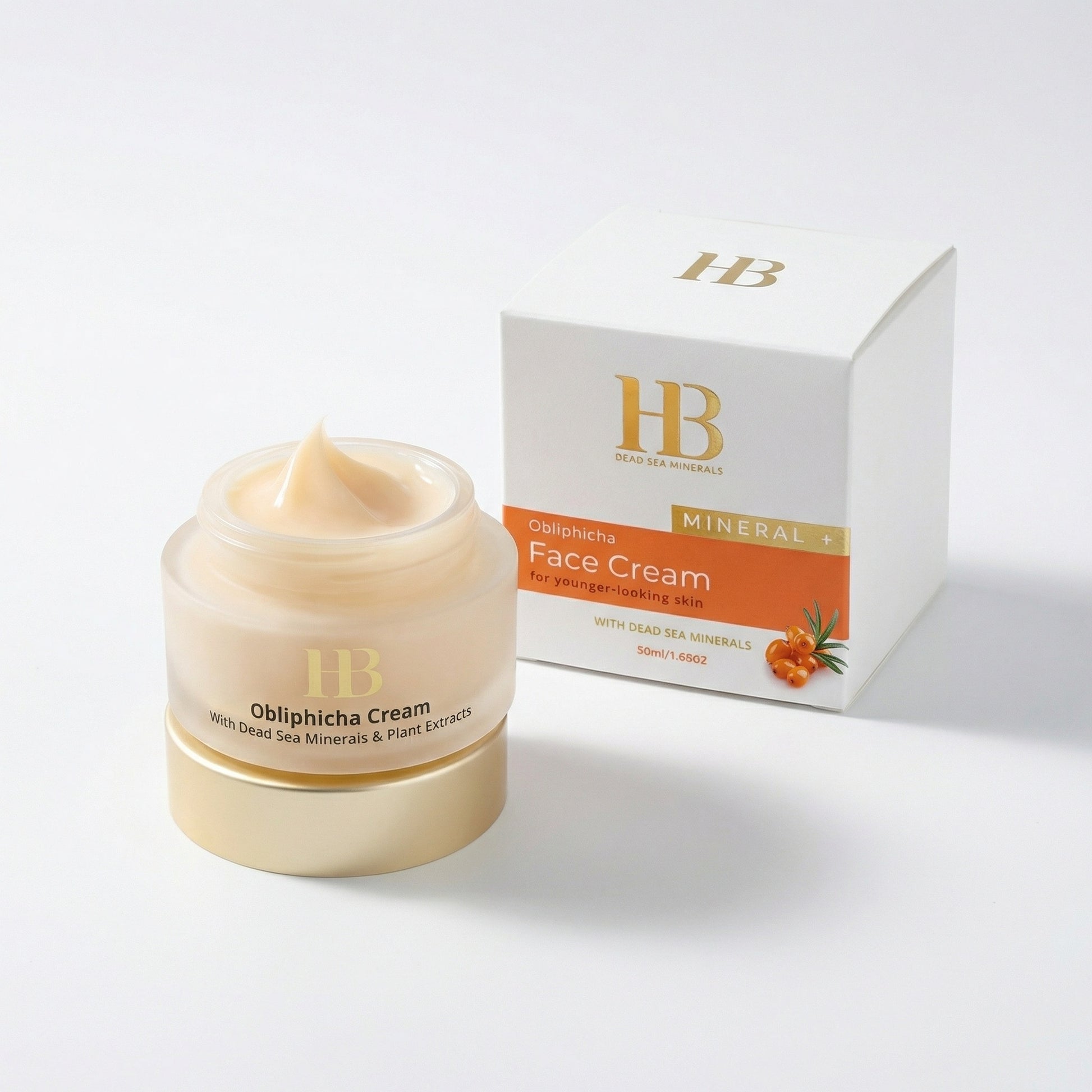 Jar of Obliphicha cream with its packaging on a white background