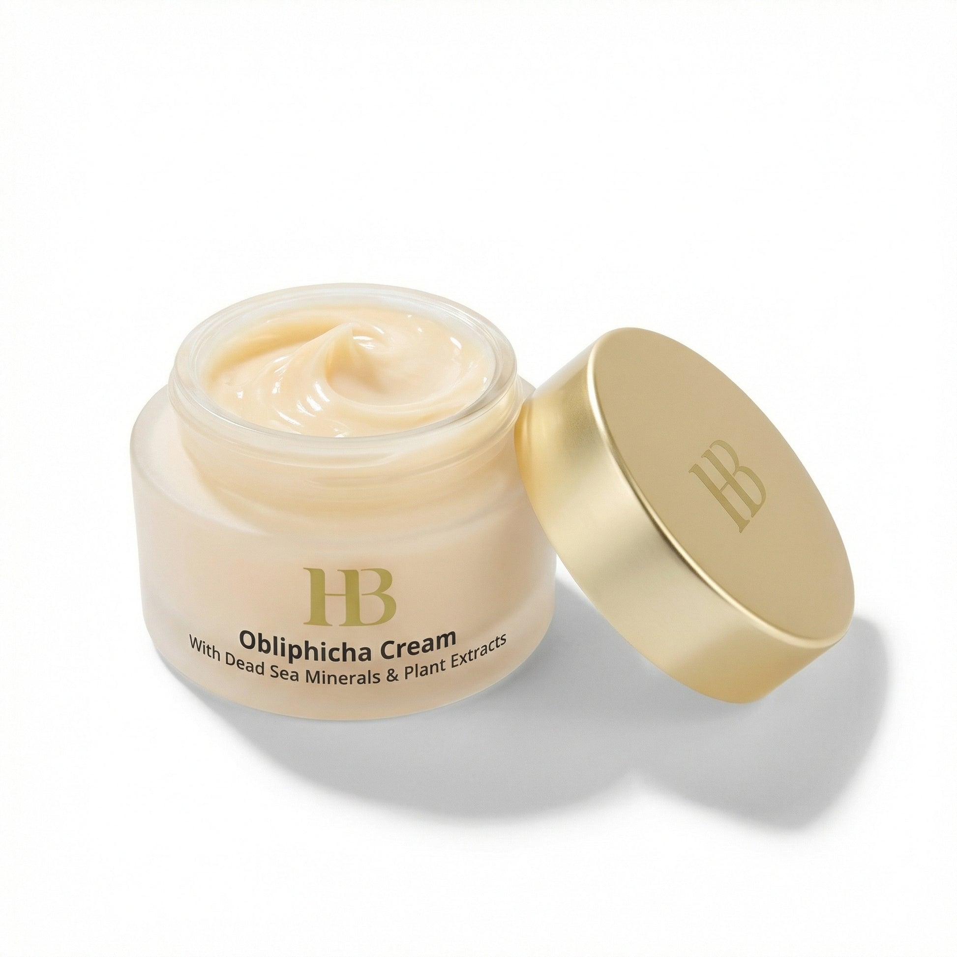 Open jar of Obliphicha Cream with Dead Sea Minerals & Plant Extracts on a white background